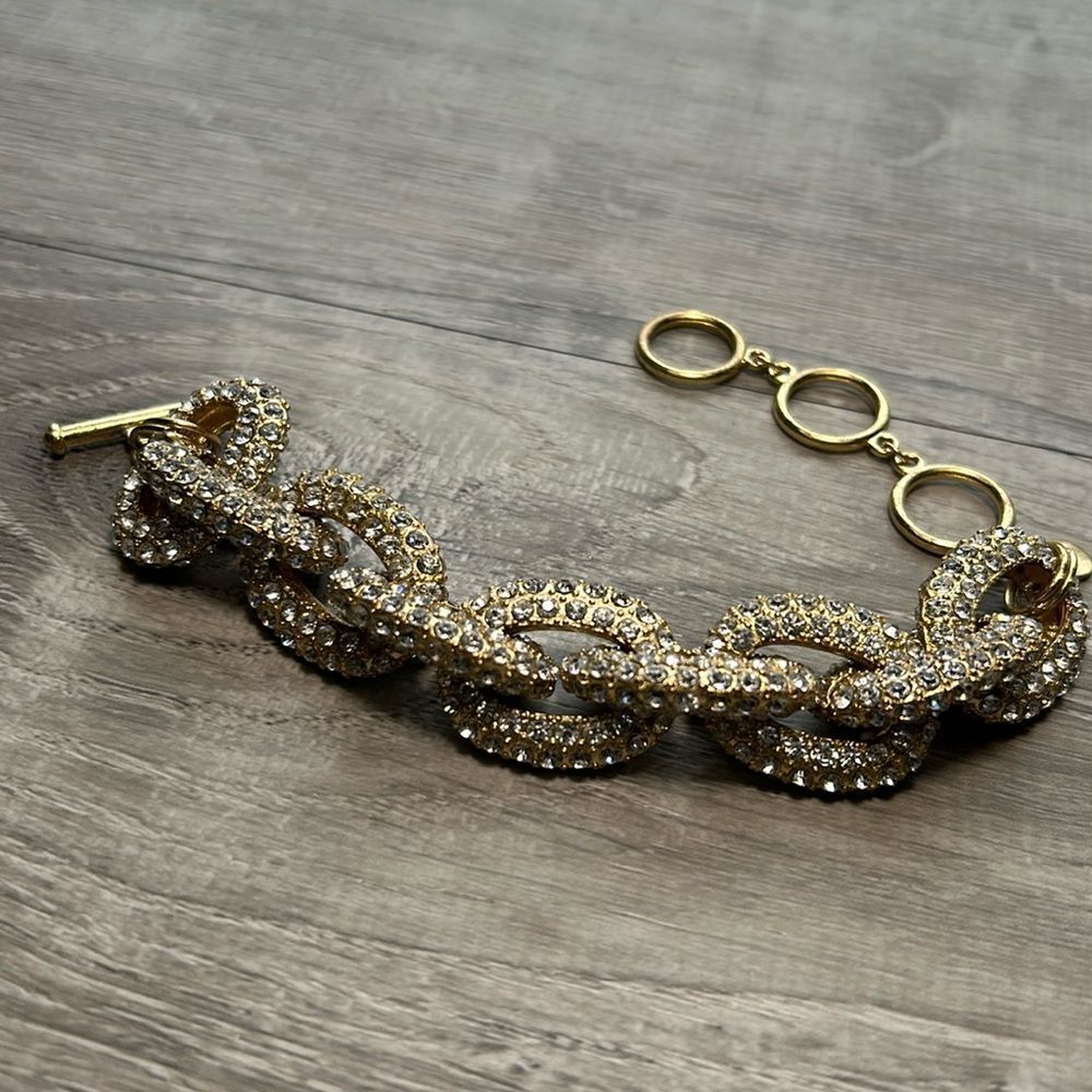 Thick gold tone encrusted bracelet